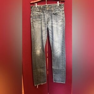 Levi's Light Blue Jeans with Pink Logo Patch